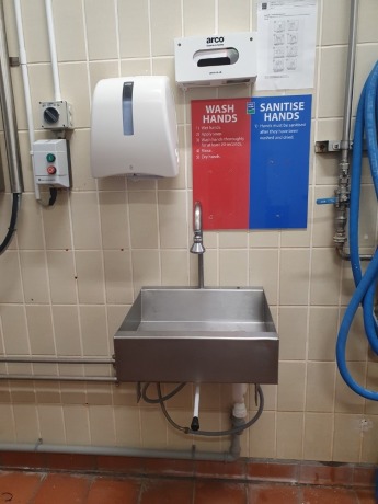 Stainless Steel Knee Operated Sink with Dispensers and Stainless Steel Rubbish Bag Holder