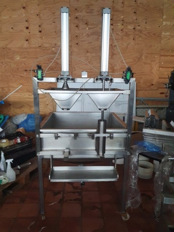 Mobile Stainless Steel Hopper with Twin Head Manual Filling Tubes and Presses