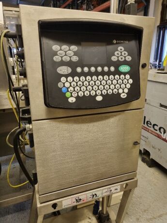 Domino A200 Inkjet coder on stand