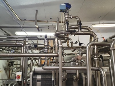 14-15000 Litre per Hour Whey Pasteuriser comprising - APV type N35 Plate Heat Exchanger with 3 Grids and Approximately 245 Plates, 2 off APV 2-3-9 Puma Pumps, Stainless Steel Balance Tank, Interconnecting Pipework Valves and Controls - 2