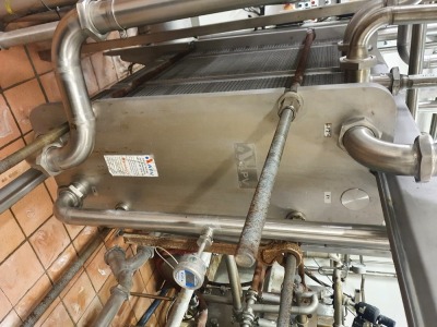 14-15000 Litre per Hour Whey Pasteuriser comprising - APV type N35 Plate Heat Exchanger with 3 Grids and Approximately 245 Plates, 2 off APV 2-3-9 Puma Pumps, Stainless Steel Balance Tank, Interconnecting Pipework Valves and Controls - 6